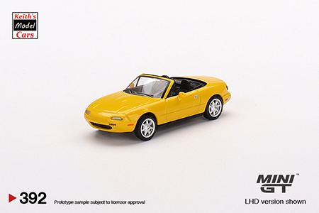 [1/64 Scale] Mazda Miata MX-5 (NA) in Sunburst Yellow by MiJo Exclusives Mini GT